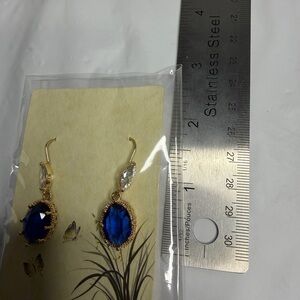 Drop everything with Gold and Blue charm